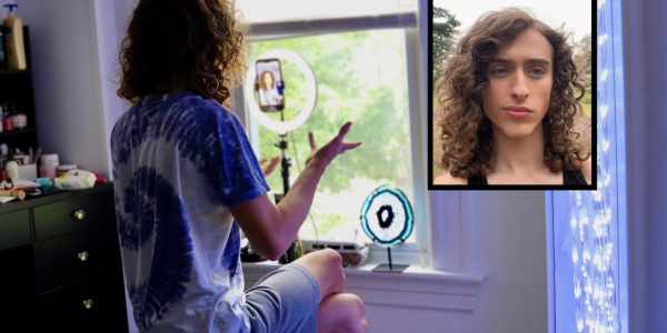 mirror shot of Zane recording a video