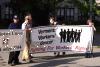 Labor holding up banners.