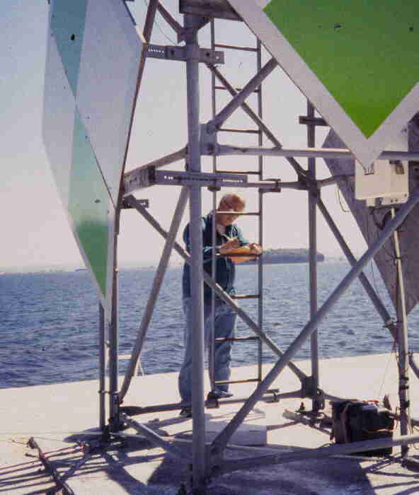 VMC Personnel performing maintenance activities at Colchester Reef meteorological station